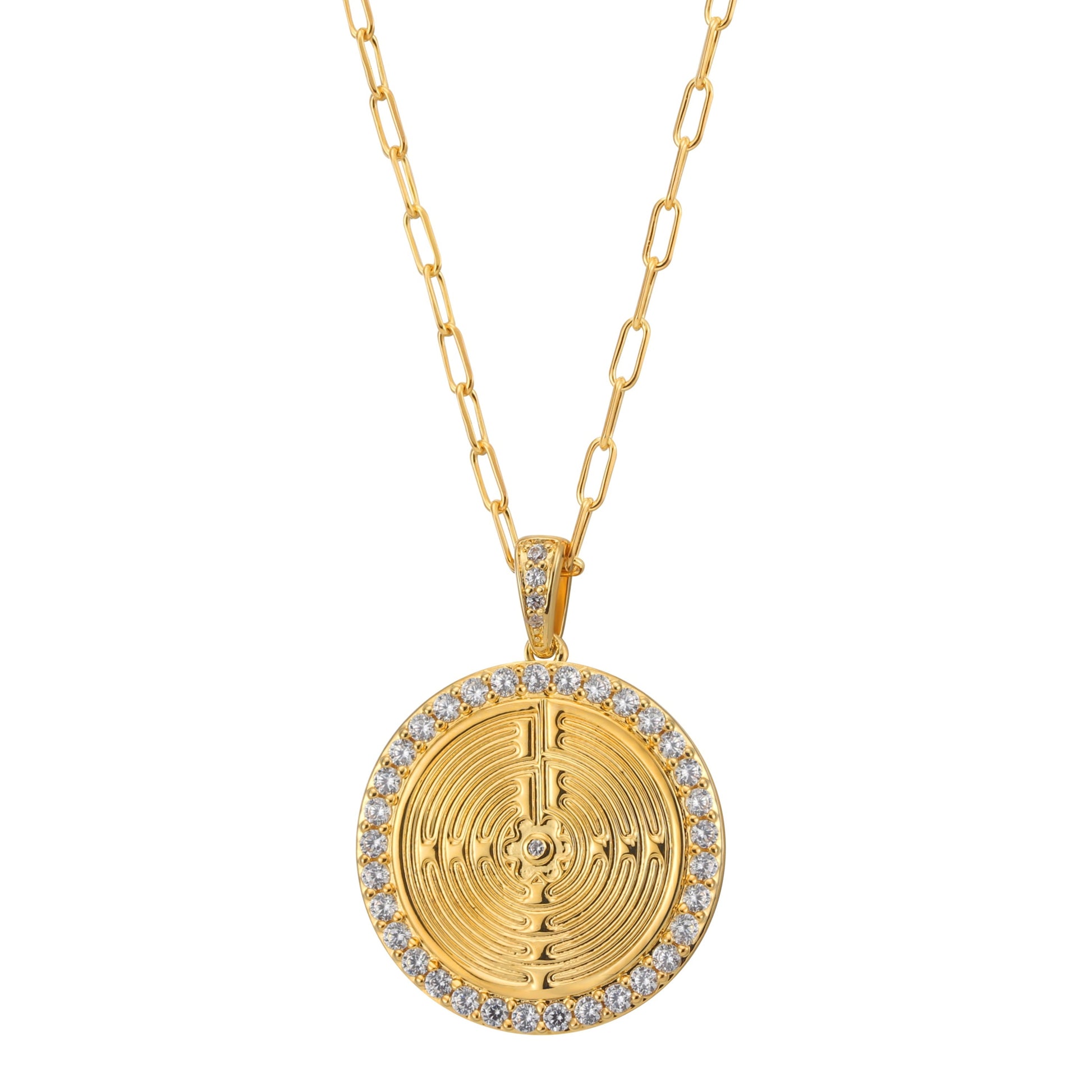 A gold-plated brass necklace with a central pendant featuring an engraved design surrounded by pavé crystals, displayed on a white background.